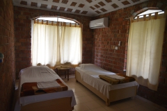 Twin-Sharing-Bedroom-in-Sadhaka-Cottages